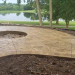 Decorative concrete patio walkway and fire pit - West Des Moines, IA - Concrete Construction