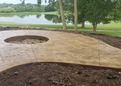 Decorative concrete patio walkway and fire pit - West Des Moines, IA