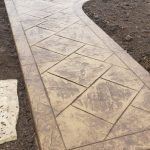 Decorative concrete patio walkway and fire pit - West Des Moines, IA - Design