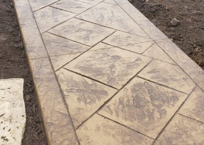 Decorative concrete patio walkway and fire pit - West Des Moines, IA