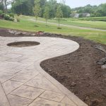 Decorative concrete patio walkway and fire pit - West Des Moines, IA - Installation