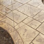 Decorative concrete patio walkway and fire pit - West Des Moines, IA - TRW Concrete Construction