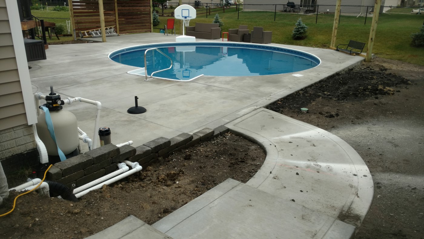 Installation of concrete pool deck - Grimes, Iowa - Concrete contractors